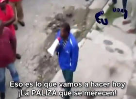 Imagen del video de UNPACU donde se muestra a un sujeto arengando a otros a darle una “paliza” a los opositores al régimen castrista