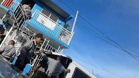 Policias en la sede la Unpacu en Santiago de Cuba