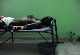 Un enfermo de cólera en Haití