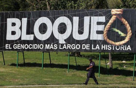 Cartel de propaganda contra el embargo/bloqueo en Cuba