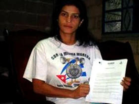 Belinda Salas, presidente de FLAMUR-capítulo Cuba, durante la presentación en 2007 de la campaña 'Con la misma moneda'.