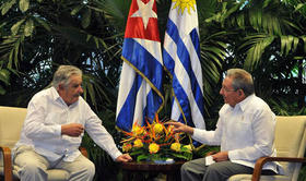 José Mujica y Raúl Castro