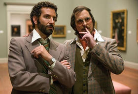 Christian Bale y Bradley Cooper en American Hustle