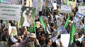 Manifestantes a favor de Gadafi en Trípoli, Libia